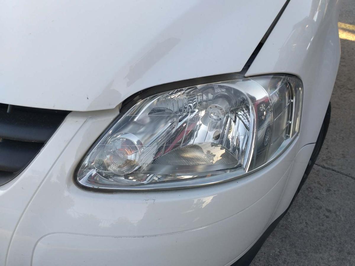 VW Fox original Scheinwerfer vorn links Halogen Bj.2010